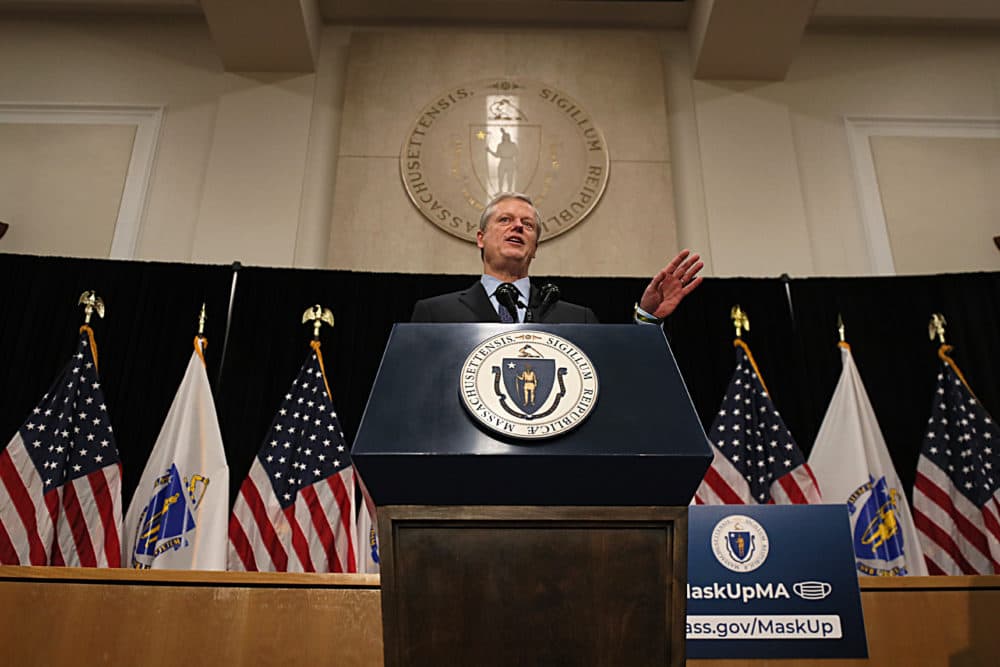 Gov. Charlie Baker addressed the media about his $668 million relief bill for small businesses during the second wave of the COVID-19 pandemic at the State House on Dec. 23, 2020. (Suzanne Kreiter/The Boston Globe via Getty Images)
