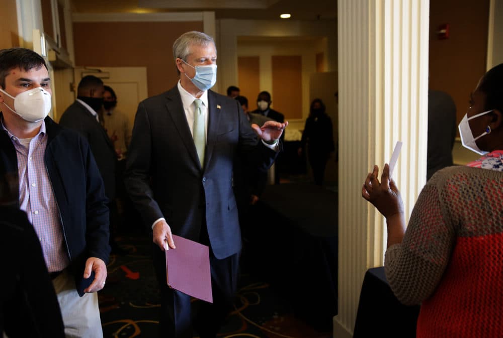 Gov. Charlie Baker tours the mass vaccination site at the DoubleTree by Hilton Hotel Boston North Shore in Danvers, MA on Feb. 10, 2021. (Photo by Jonathan Wiggs/The Boston Globe via Getty Images)