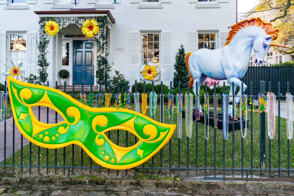 A house is decorated with oversized Mardi Gras masks, beads and unicorns on February 7, 2021 in New Orleans, Louisiana. Due to the COVID-19 pandemic cancelling traditional Mardi Gras activities, New Orleanians are decorating their homes and businesses to resemble Mardi Gras floats. (Erika Goldring/Getty Images)