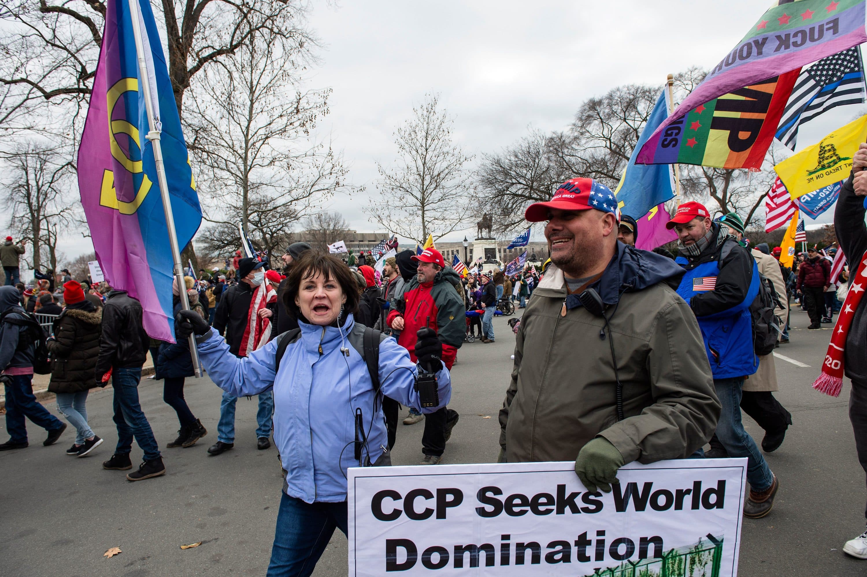 Natick Town Meeting member Suzanne Ianni and Mark Sahady march through the streets of Washington, D.C., before they allegedly stormed the Capitol building on Jan. 6. (Joseph Prezioso/AFP via Getty Images)