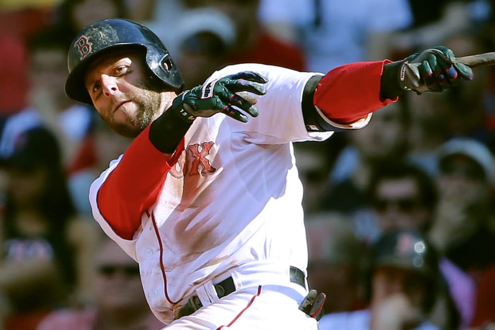 In this June 13, 2015, file photo, Boston Red Sox's Dustin Pedroia watches a hit against the Toronto Blue Jays during the 10th inning of a game at Fenway Park. Pedroia, who was the 2007 Rookie of the Year and the AL MVP in his second season, retired Monday. (Winslow Townson/AP)