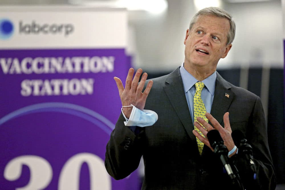 Massachusetts Gov. Charlie Baker speaks at a vaccination site at the Natick Mall on Feb. 24. A year of battling the spread of the coronavirus has taken a political toll on Baker as he faces slumping popularity. (Matt Stone/Boston Herald via AP, Pool, File)