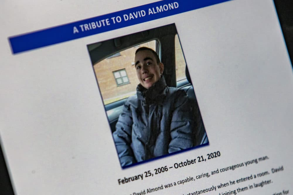 A photo of an image of David Almond contained in the Office of the Child Advocate's report on his death. (Jesse Costa/WBUR)