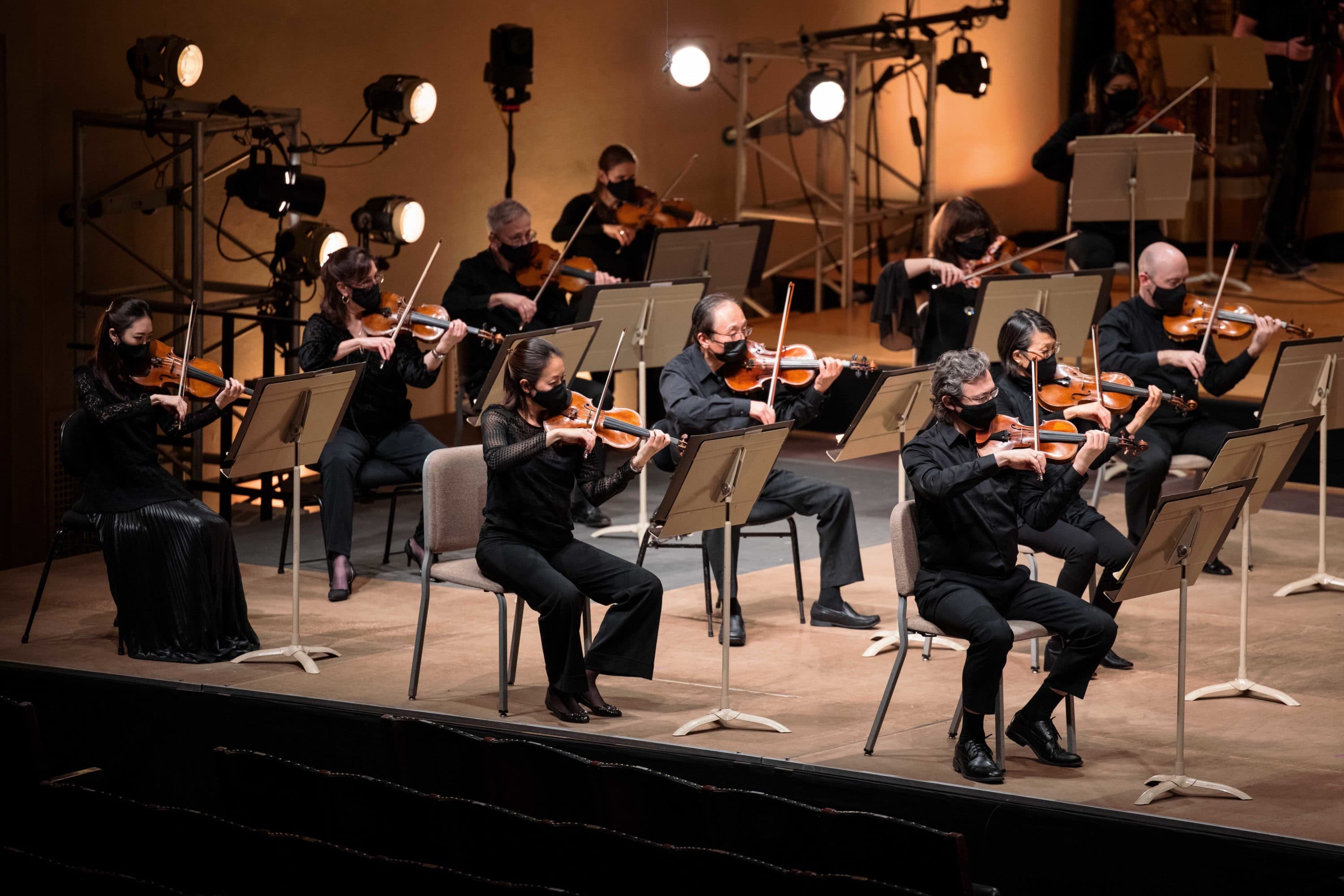 The BSO's violin section during a video shoot directed by Habib Azar. (Courtesy BSO/Aram Boghosian)