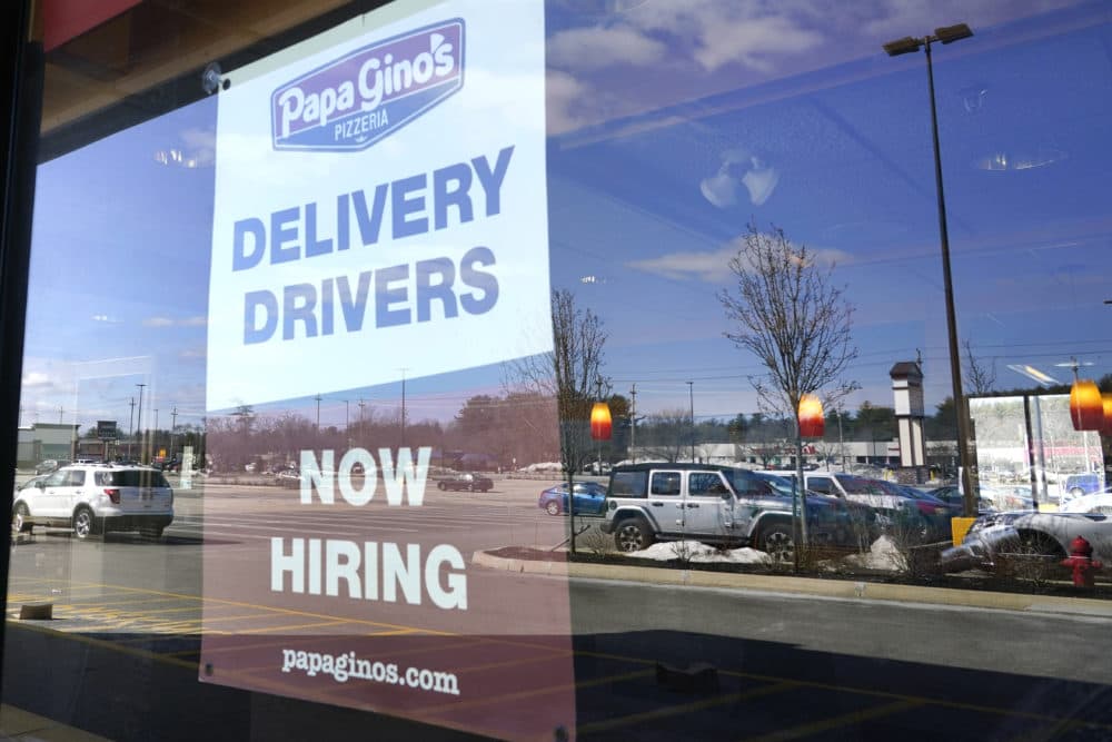 A &quot;Now Hiring&quot; sign is displayed, Thursday, March 4, 2021, in Salem, N.H. (Elise Amendola/AP)