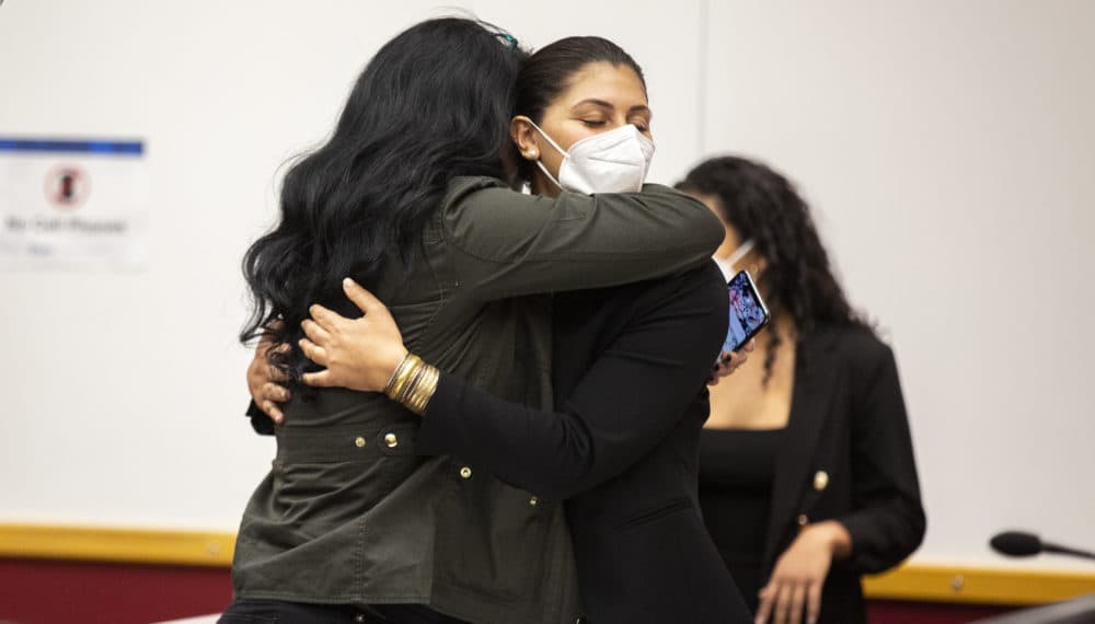 Des Moines Register reporter Andrea Sahouri, facing, hugs her mother after being found not guilty at the conclusion of her trial on March 10, 2021, in Des Moines, Iowa. An Iowa jury acquitted Sahouri, who was pepper-sprayed and arrested by police in the summer of 2020 while covering a protest in a case that critics have derided as an attack on press freedom and an abuse of prosecutorial discretion. (Kelsey Kremer/The Des Moines Register via AP, Pool)