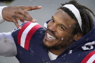 The New England Patriots are completing an agreement to re-sign free-agent quarterback Cam Newton, a person with knowledge of the negotiations told The Associated Press on Friday. (Elise Amendola/AP File)