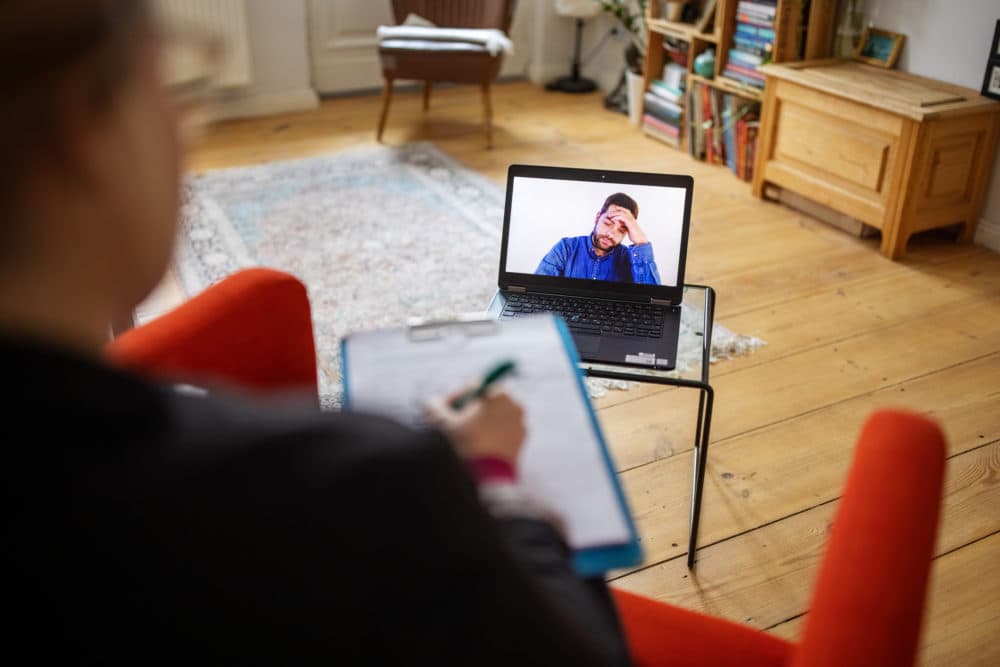 A patient has a video call with mental health therapist. (Getty Images)