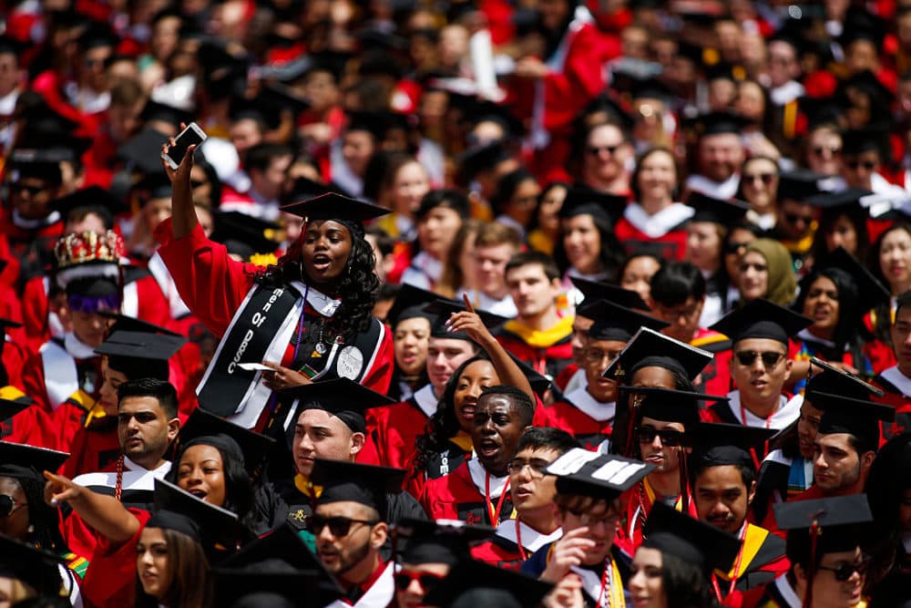 Students yell to President Barack Obama after he receives an honorary doctorate of laws during the 250th anniversary commencement ceremony at Rutgers University on May 15, 2016 in New Brunswick, New Jersey. (Eduardo Munoz Alvarez/Getty Images)