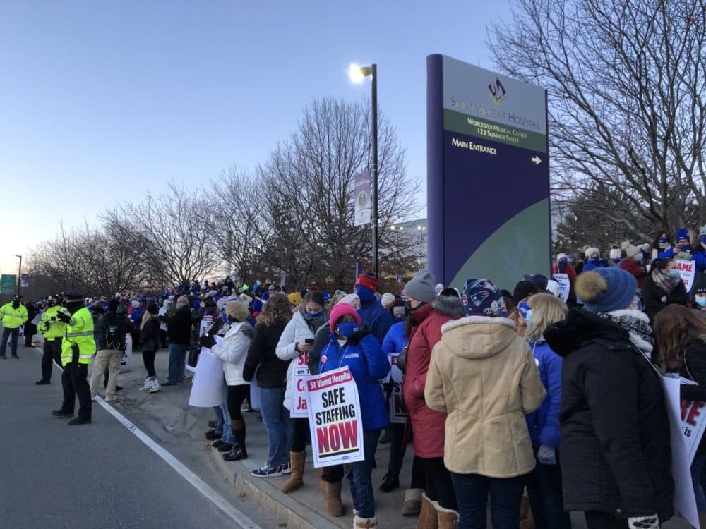 Nurses outside St. Vincent Hospital in Worcester Monday morning, gathering to strike. (Lynn Jolicoeur/WBUR)