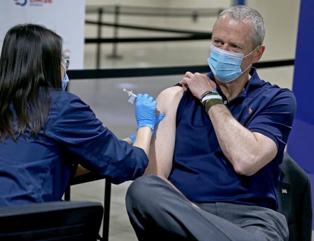 Gov. Charlie Baker receives his first dose of the COVID-19 vaccine at Hynes Convention Center on April 6. (Matt Stone/MediaNews Group/Boston Herald)