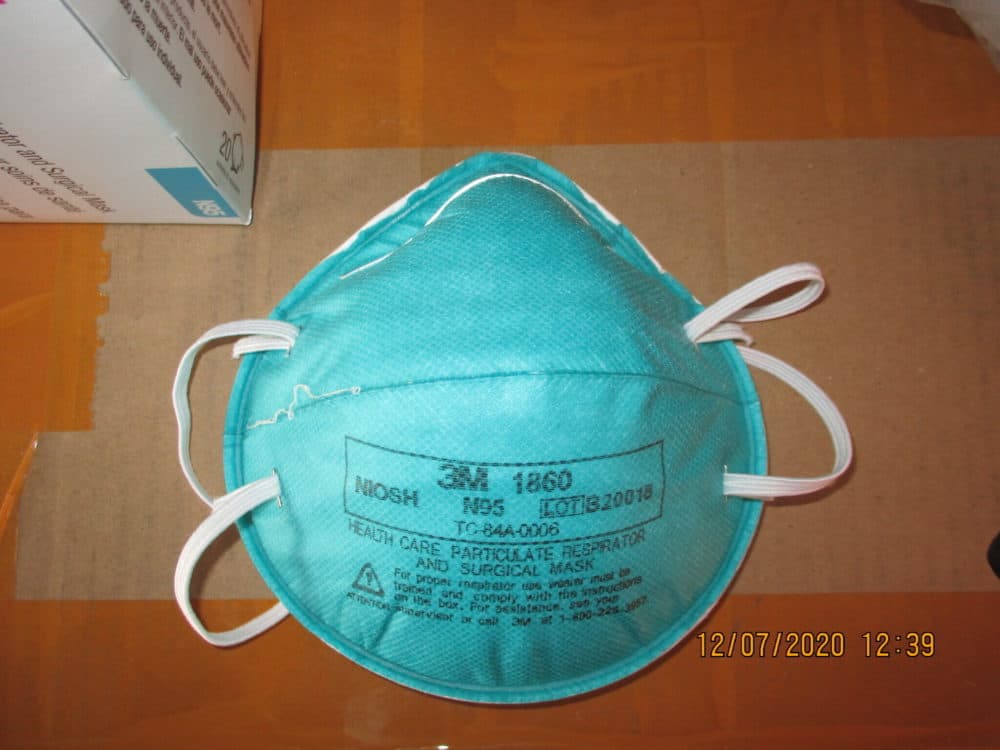 This December 2020 image provided by U.S. Immigration and Customs Enforcement (ICE) shows a counterfeit N95 surgical mask that was seized by ICE and U.S. Customs and Border Protection. (ICE via AP)