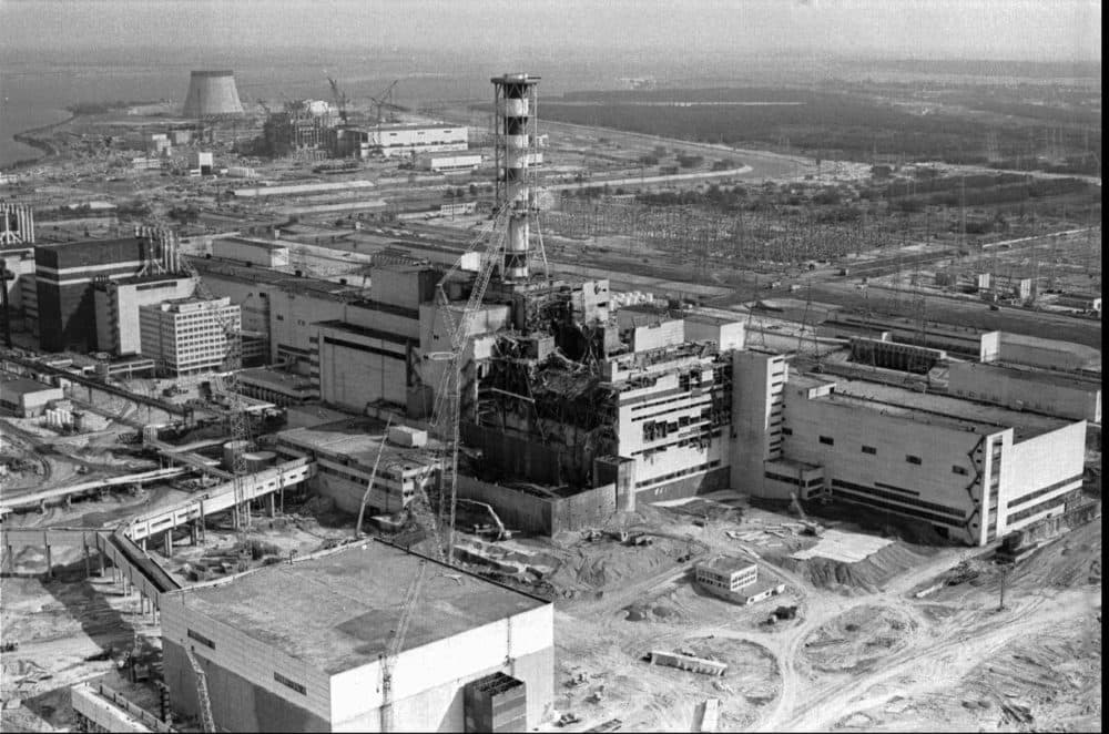 This April 26, 1986 file photo shows an aerial view of the Ukrainian Chernobyl nuclear plant, with damage from an explosion and fire in reactor four on that sent large amounts of radioactive material into the atmosphere. (Volodymyr Repik/AP)
