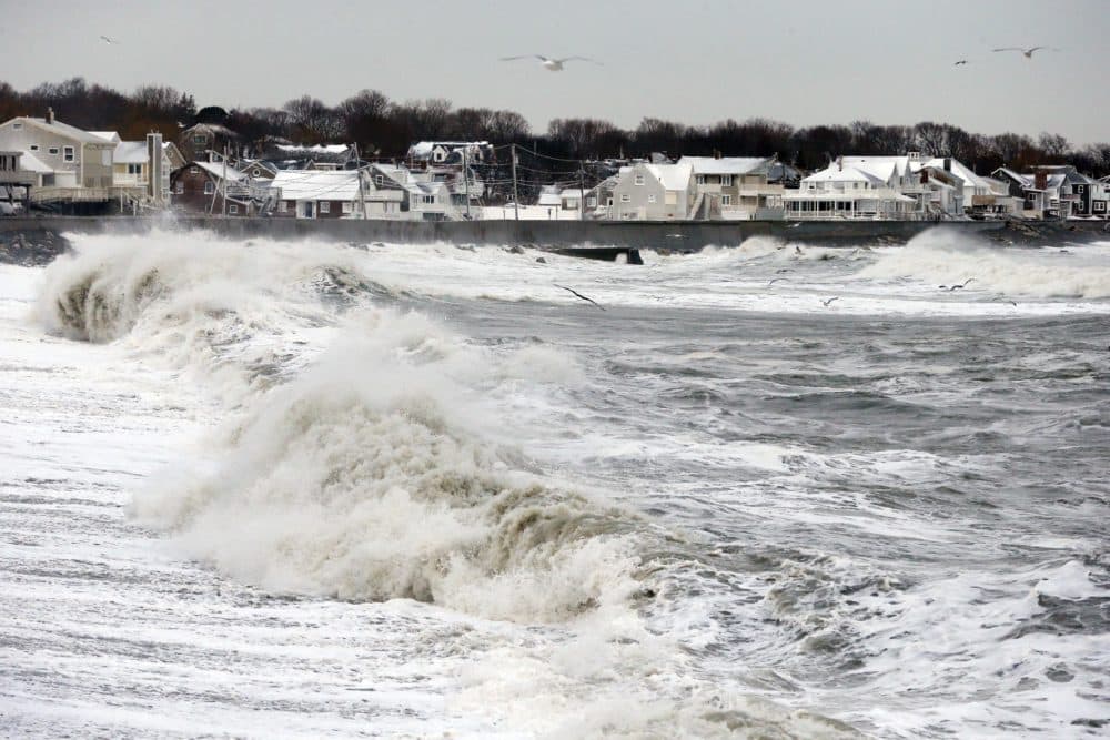 Ocean waves continue to come ashore a day after a winter storm in Scituate, Mass., Jan. 28, 2015. (Michael Dwyer/AP)