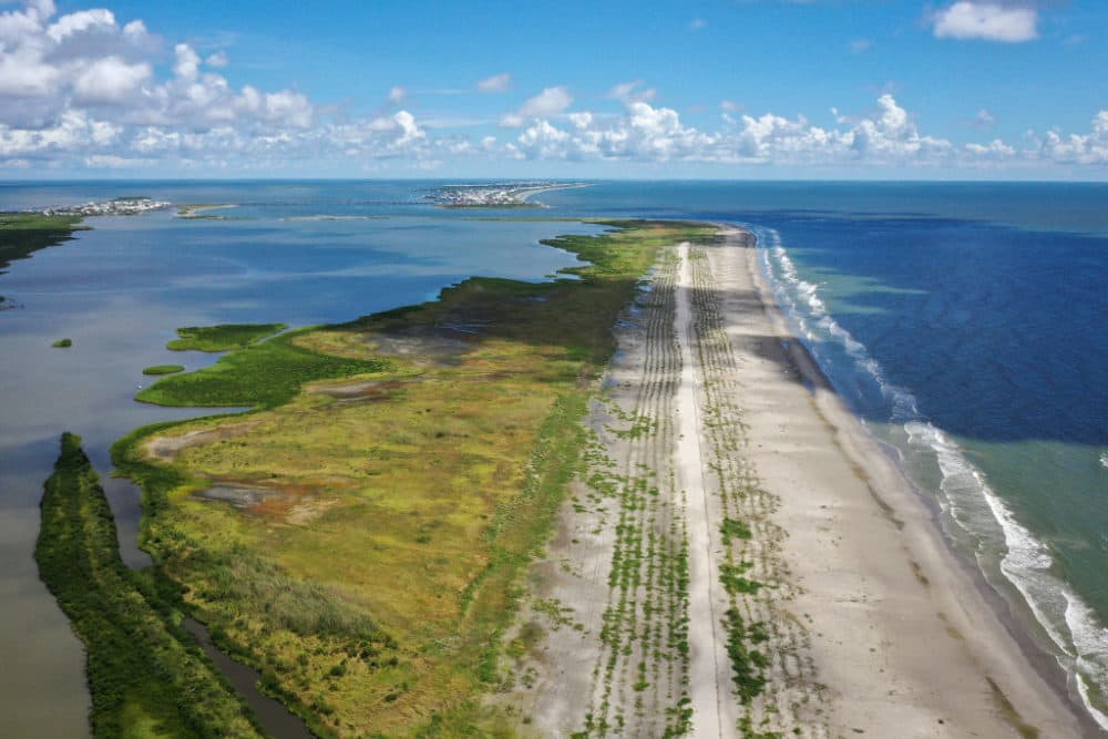 A view of the newly restored Caminada Headland, a 13-mile-long barrier island system that buffers the Louisiana coast from tropical storms and surge, August 24, 2019 in Grand Isle, Louisiana. According to researchers at the National Oceanic and Atmospheric Administration (NOAA), Louisiana's combination of rising waters and sinking land give it one of the highest rates of relative sea level rise on the planet. (Drew Angerer/Getty Images)