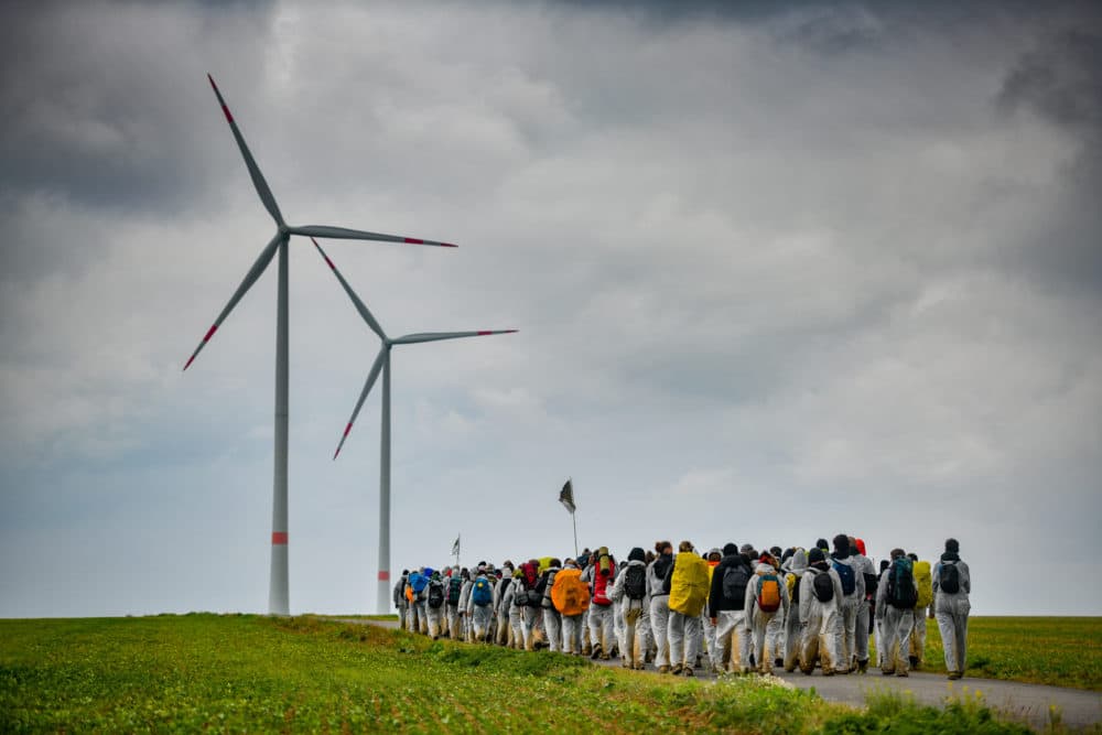 Climate activists march in an attempt to occupy the Garzweiler open-cast coal mine and nearby gas infrastructure on a day of civil disobedience organized by the &quot;Ende Gelaende&quot; movement on September 26, 2020 near Grevenbroich, Germany. (Sascha Schuermann/Getty Images)