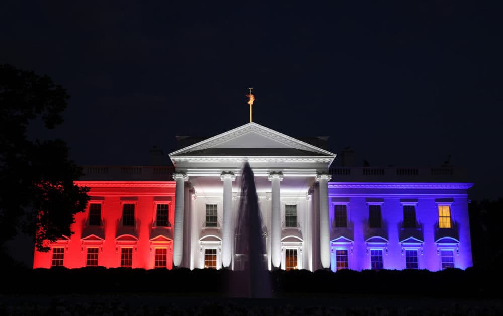 The White House is bathed in red, white and blue light as part of the Fourth of July celebration July 4, 2020 in Washington, DC. President Trump is hosting a “Salute To America” celebration that includes flyovers by military aircraft and a large fireworks display. (Photo by Win McNamee/Getty Images)