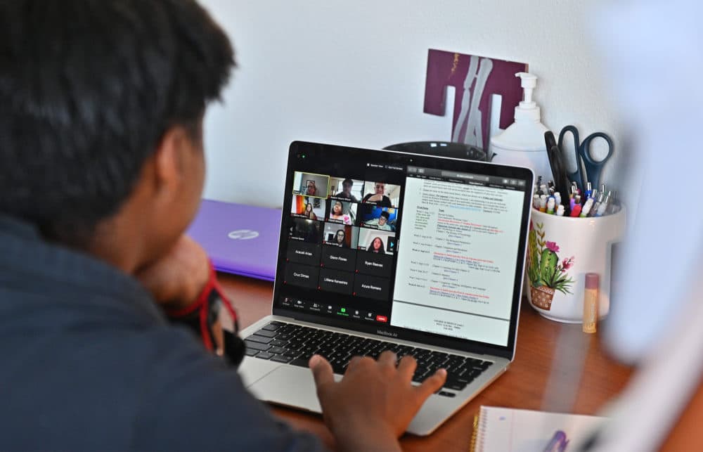 A college freshman participates in a Zoom meeting for an 'Introduction to Psychology' course. (Sam Wasson/Getty Images)