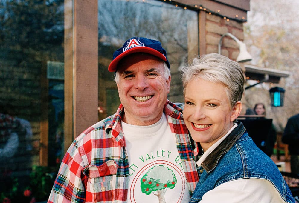 Presidential candidate John McCain (L) and his wife, Cindy McCain, smile for the camera at their family ranch, March 9, 2000, near Sedona, Arizona. (David Hume Kennerly/Getty Images)