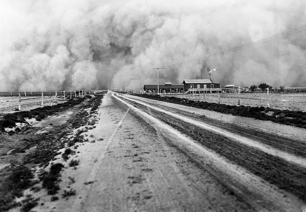 A farm about to be enveloped by a dust storm during the great Dust Bowl of the 1930s. (Corbis via Getty Images)
