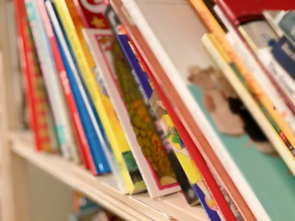 A bookshelf packed with children's books. (Catherine McQueen/Getty Images)