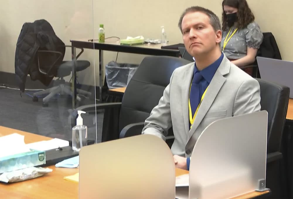 In this image from video, former Minneapolis police Officer Derek Chauvin listens as his defense attorney Eric Nelson gives closing arguments as Hennepin County Judge Peter Cahill preside Monday in the trial of Chauvin at the Hennepin County Courthouse in Minneapolis. (Court TV via AP, pool)