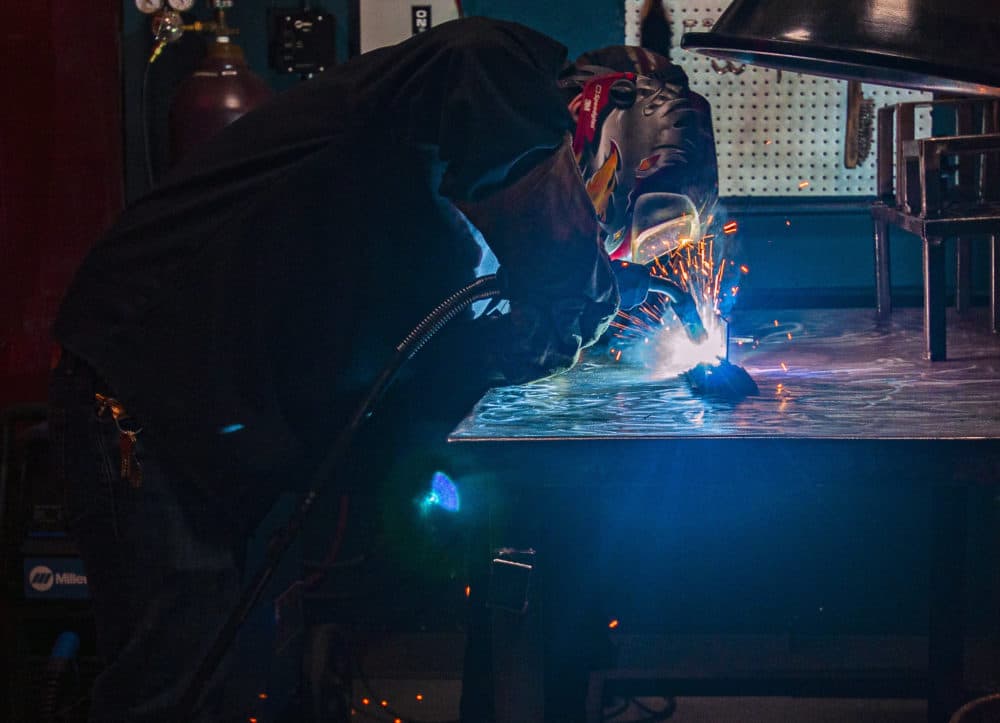 Anthony Grochowski welding at the Jane Addams Resource Corporation (JARC). (Chris Bentley/Here & Now)