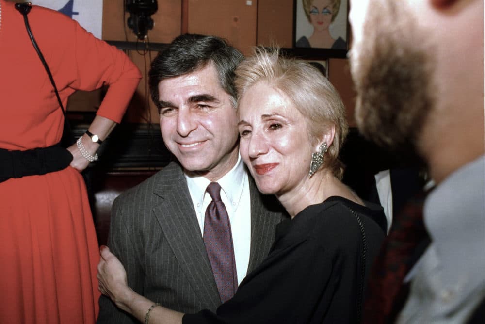 In this Feb. 23, 1988 photo, Massachusetts Gov. Michael Dukakis poses with cousin Olympia Dukakis during fundraiser in New York. (Ray Stubblebine/AP)