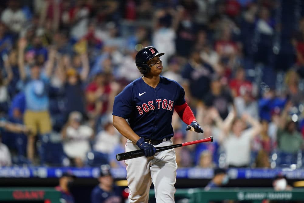 Boston Red Sox's Rafael Devers watches after hitting a two-run home run off Philadelphia Phillies pitcher Connor Brogdon during the seventh inning of an interleague baseball game, Friday, May 21, 2021, in Philadelphia. (Matt Slocum/AP)