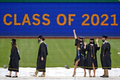 University of Pittsburgh candidates for graduation line up to receive their diplomas during the graduation ceremony for the Kenneth P. Dietrich School of Arts and Sciences and the School of General Studies at PNC Park in Pittsburgh, May 4, 2021.(Gene J. Puskar/AP)