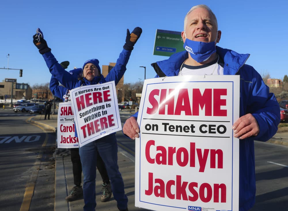 Paul Stuart, a tech at St. Vincent, and Betty Ann Warner, a 40 year veteran RN at the hospital, get the group of more than 300 fired up as the union nurses announce a strike in Worcester, MA on March 7, 2021. (Matthew J. Lee/The Boston Globe via Getty Images)