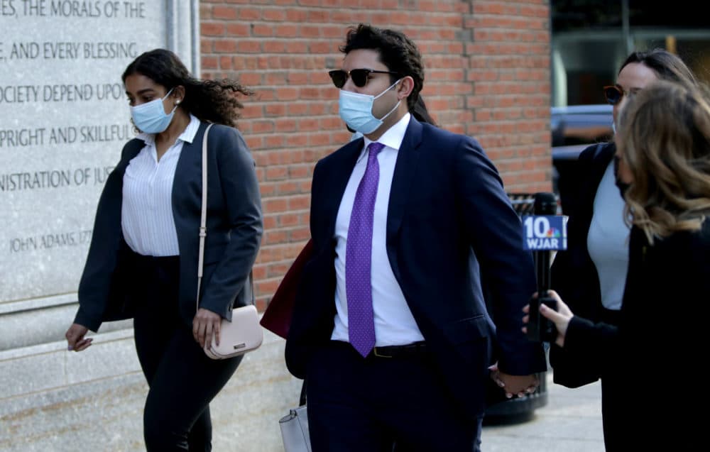 Former Fall River Mayor Jasiel Correia, center, arrives at federal court in South Boston. He did not take questions as he headed to federal court in Boston on May 11, 2021. (Jonathan Wiggs/The Boston Globe via Getty Images)