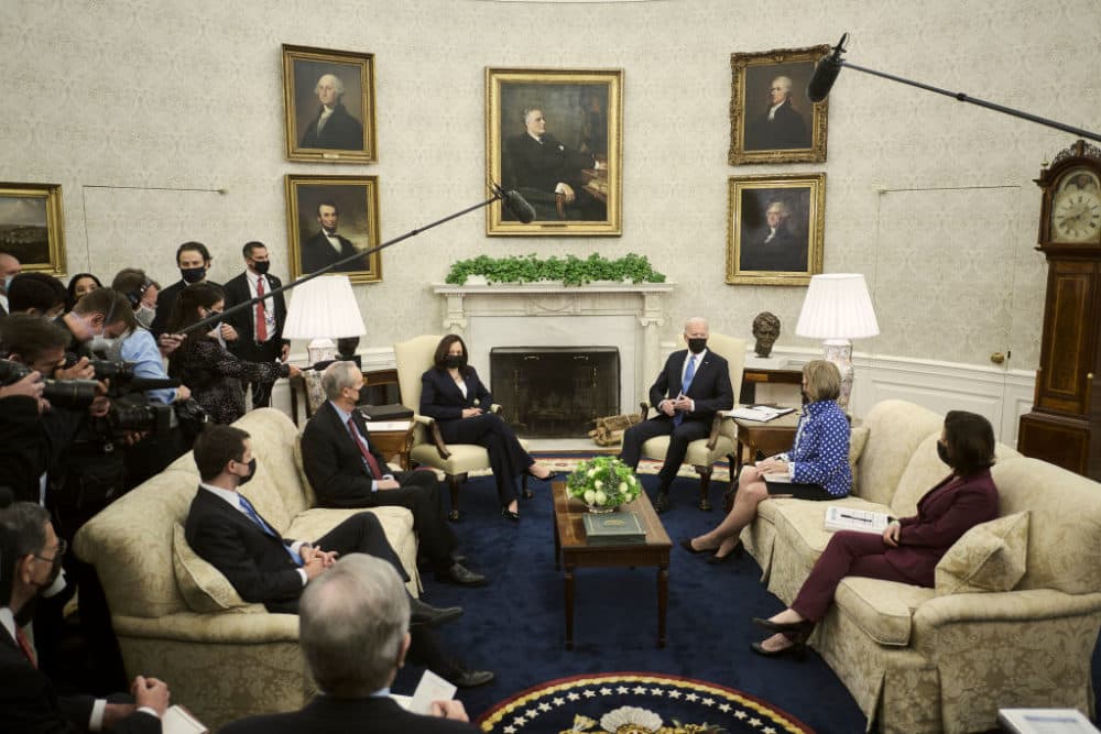President Joe Biden speaks to the press during a meeting with (L-R) Transportation Secretary Pete Buttigieg, Sen. Mike Crapo (R-ID), Vice President Kamala Harris, Sen. Shelley Capito (R-WV), and Commerce Secretary Gina Raimondo, to discuss the administration’s infrastructure plan at the White House on May 13, 2021 in Washington, D.C. (T.J. Kirkpatrick-Pool/Getty Images)
