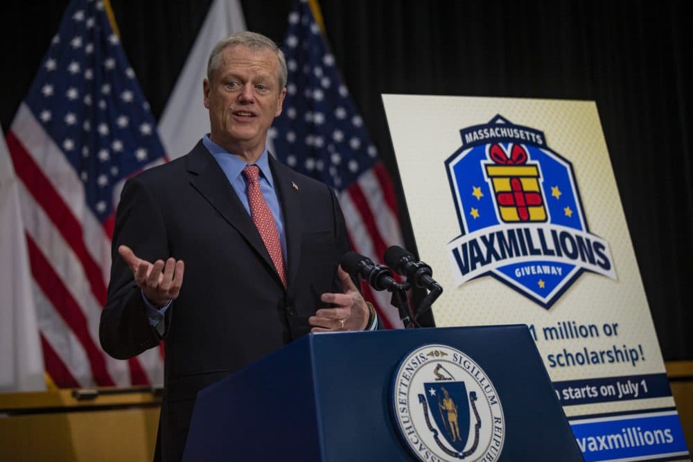 Gov. Charlie Baker announces the end of the state of emergency and the VaxMillions program. (Jesse Costa/WBUR)