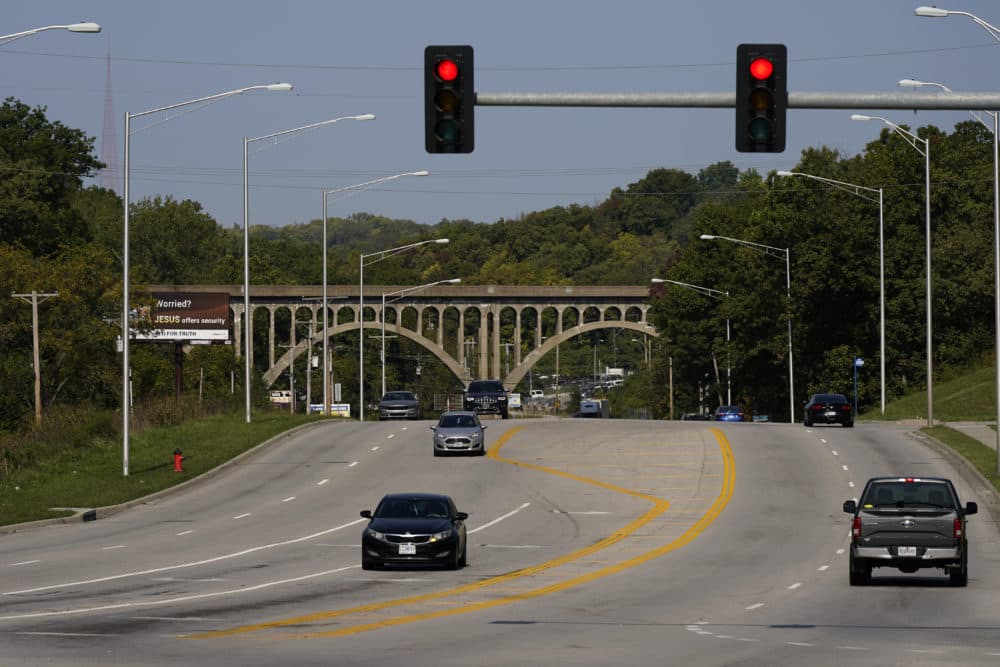 Cars travel under a landmark railroad viaduct in Kansas City, Mo. (Charlie Riedel/AP)