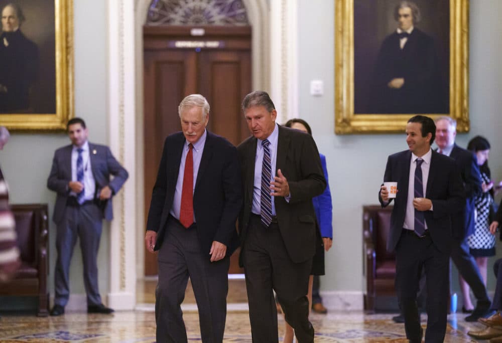 Sen. Angus King, I-Maine, left, and Sen. Joe Manchin, D-W.Va., walk to the chamber as the Senate tries to finish to its work going into the Memorial Day recess with Republican leaders insisting they will block a commission on the Jan. 6 insurrection, at the Capitol in Washington, Friday, May 28, 2021.  (J. Scott Applewhite/AP)