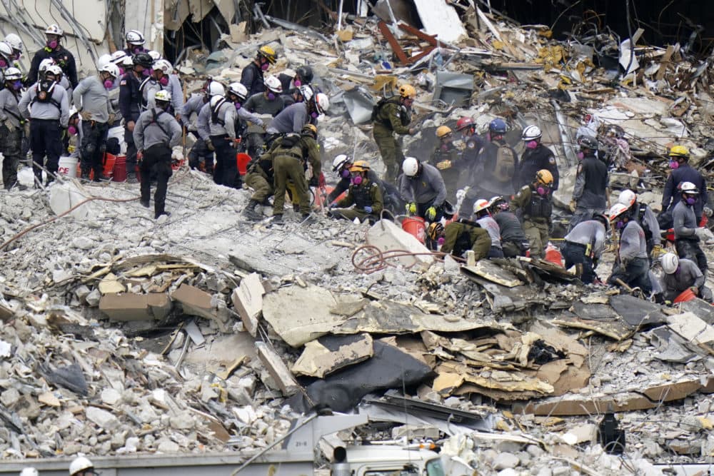 Crews from the U.S. and Israel work in the rubble Champlain Towers South condo on June 29, 2021, in Surfside, Fla. Many people were still unaccounted for after Thursday's fatal collapse. (Lynne Sladky/AP)