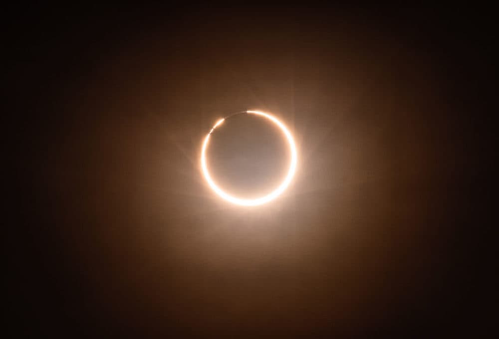 An annular eclipse of the sun, photographed on the rooftop of a hotel in Xiamen City, China, on June 21, 2020. (Costfoto/Barcroft Media via Getty Images)