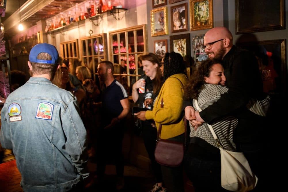 Fully vaccinated customers gather at the bar inside Risky Business, a private members-only club, that was once The Other Door but closed during the Covid-19 pandemic in the North Hollywood neighborhood of Los Angeles, California on May 21, 2021. (Patrick T. Fallon/AFP via Getty Images)