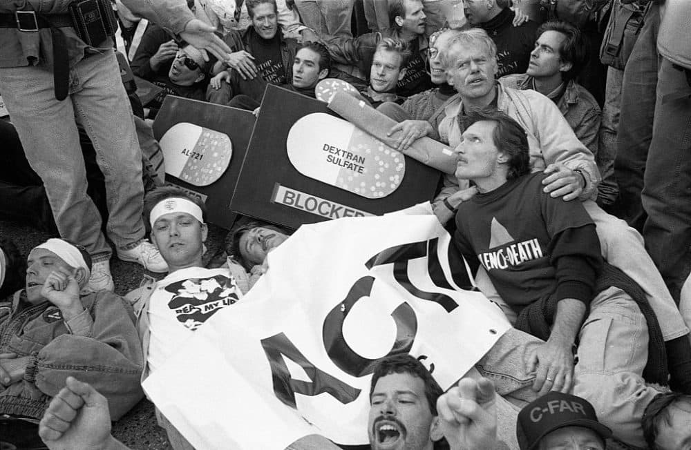 AIDS activist group ACT UP (AIDS Coalition to Unleash Power) protest at the headquarters of the Food and Drug Administration (FDA) on October 11, 1988 in Rockville, Maryland.  The action, called SEIZE CONTROL OF THE FDA by the group, shut down the FDA for the day.  (Photo by Catherine McGann/Getty Images)