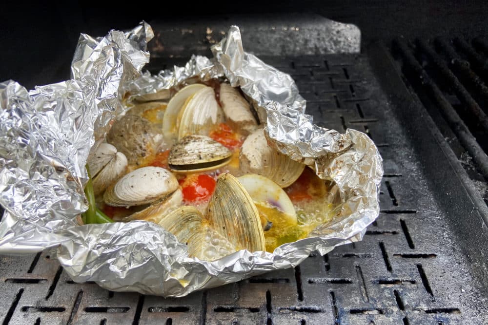 Clam Packets With Scallions, Tomatoes, Garlic And Chorizo. (Kathy Gunst)