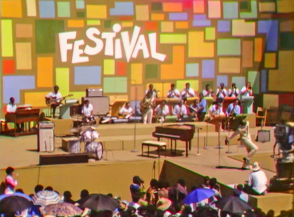 Tony Lawrence hosts the Harlem Cultural Festival in 1969, featured in &quot;Summer of Soul.&quot; (Photo courtesy of Searchlight Pictures. © 2021 20th Century Studios)