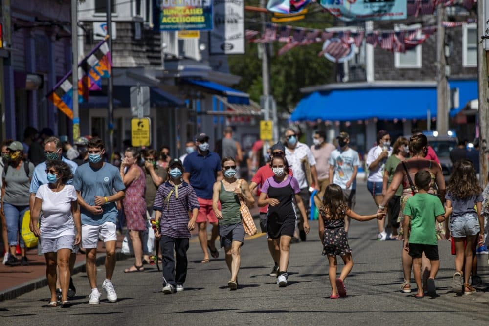 Tourists walk along Commercial Street in Provincetown in September 2020. (Jesse Costa/WBUR)