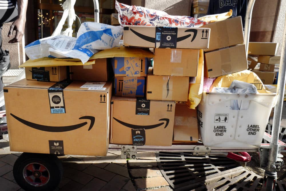 Amazon Prime boxes are loaded on a cart for delivery in New York. (Mark Lennihan, File/AP Photo)