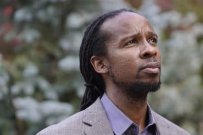 Ibram X. Kendi, director of Boston University's Center for Antiracist Research, stands for a portrait in Boston. (Steven Senne/AP)