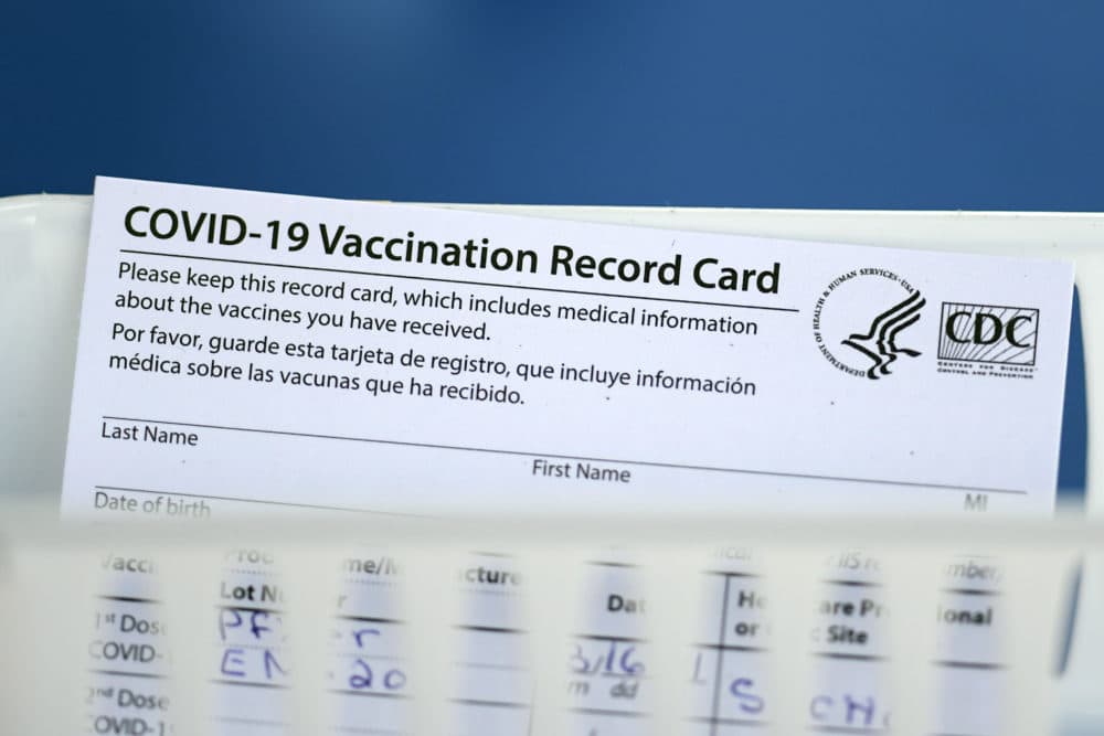 A COVID-19 vaccination record card. (David J. Phillip/AP)