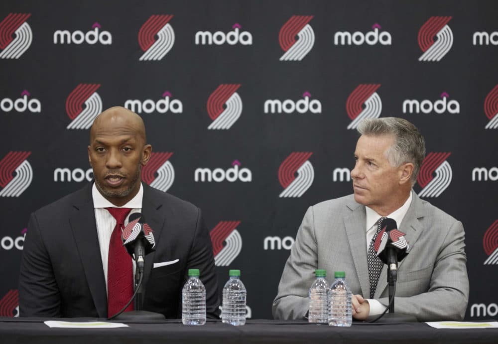 Neil Olshey, right, and Chauncey Billups talk to the media after Billups was announced as the head coach of the Portland Trail Blazers at the team's practice facility in Tualatin, Ore., June 29, 2021. (Craig Mitchelldyer/AP)