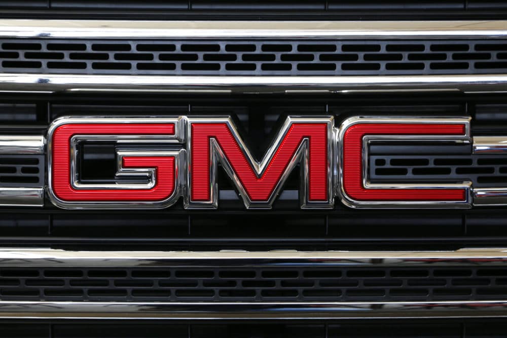 The GMC logo on display at an auto show in Pittsburgh in 2016. General Motors is recalling more than 400,000 pickup trucks in the U.S. because the side air bags can explode without warning and spew parts into the cabin. (Gene J. Puskar/AP)
