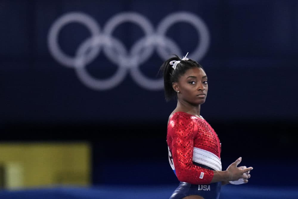 Simone Biles waits to perform on the vault during the artistic gymnastics women's final at the 2020 Summer Olympics, Tuesday, July 27, 2021, in Tokyo. (Gregory Bull/AP)