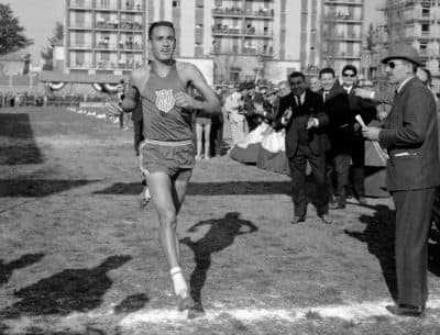 American Olympic gold medalist Billy Mills running in 1965. (AP Photo)